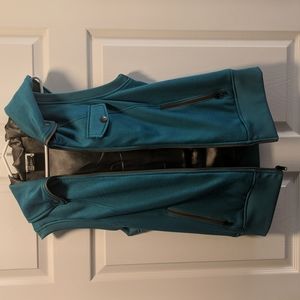 Women's teal blue Burton vest.
